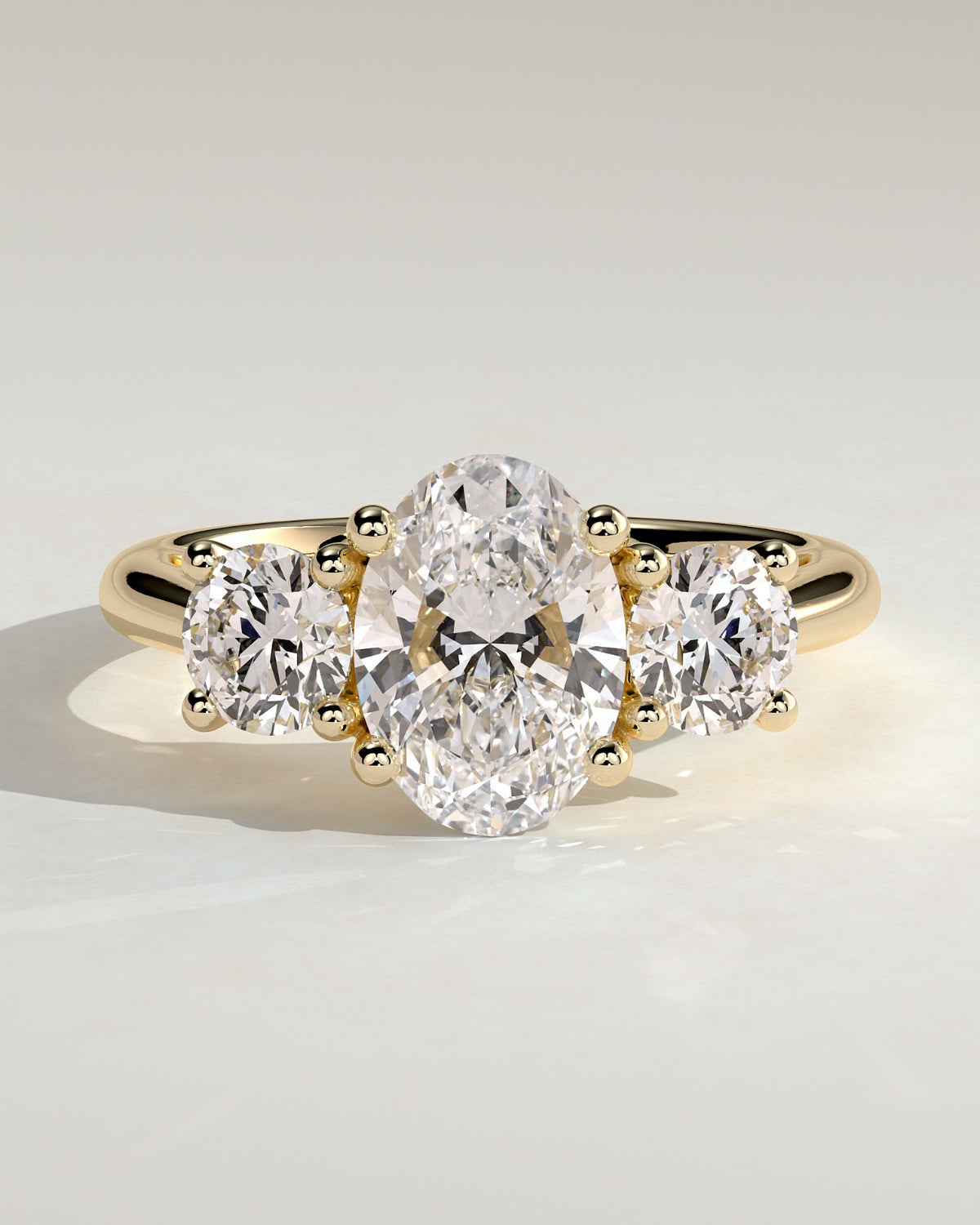 2.0 CT Oval Diamond Devotion Round Accent Tapered Three Stone Engagement Ring