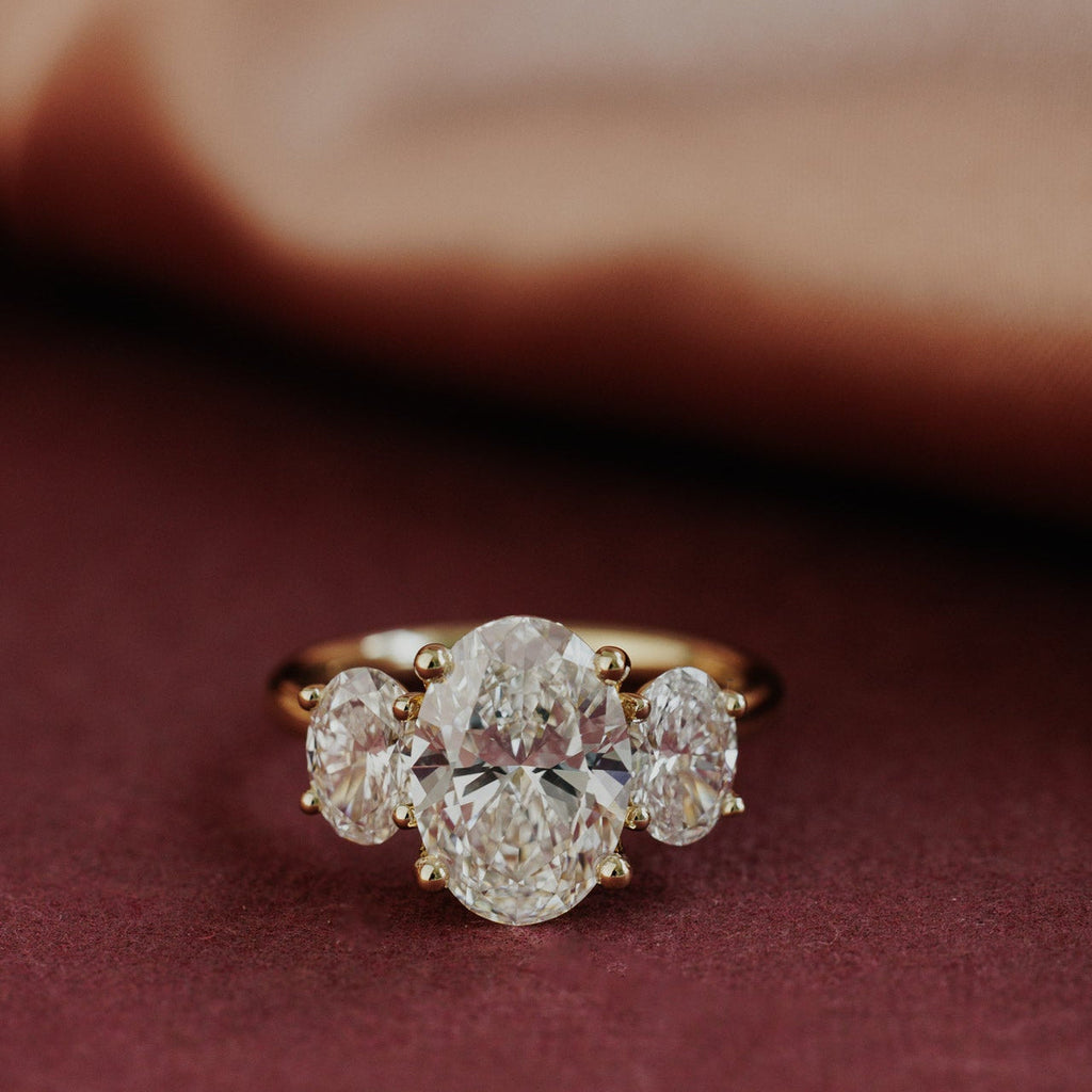 2.0 CT Oval Diamond Devotion Three Stone Engagement Ring