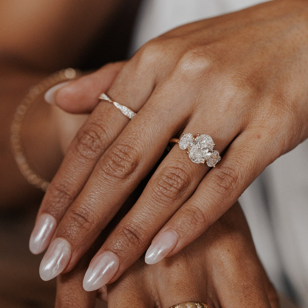 2.0 CT Oval Diamond Devotion Three Stone Engagement Ring