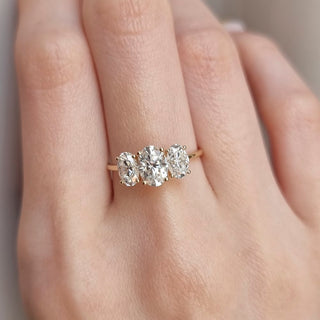 1.0 CT Oval Cut Three Stone Style Moissanite Engagement Ring