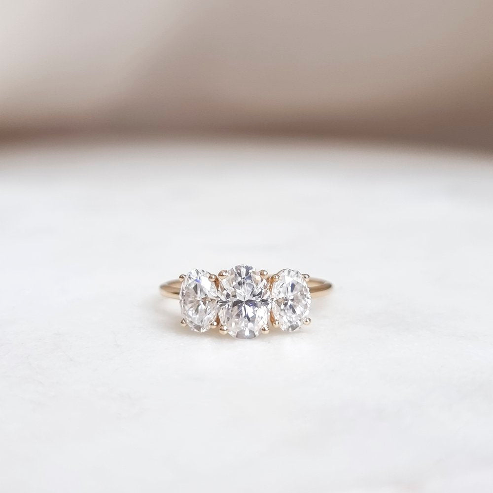 1.0 CT Oval Cut Three Stone Style Moissanite Engagement Ring
