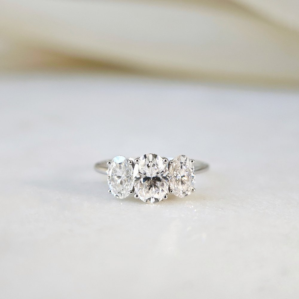1.0 CT Oval Cut Three Stone Style Moissanite Engagement Ring