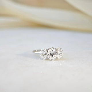 1.0 CT Oval Cut Three Stone Style Moissanite Engagement Ring