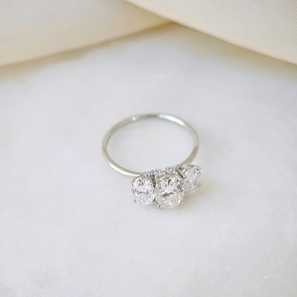 1.0 CT Oval Cut Three Stone Style Moissanite Engagement Ring