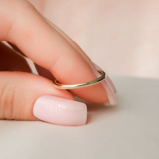 Simple plain wedding band with smooth polished finish – elegant and timeless