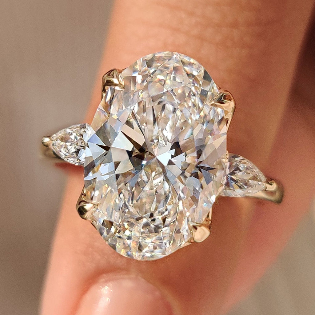5.0 CT Oval Diamond Brilliance Pear Accent Three Stone Engagement Ring