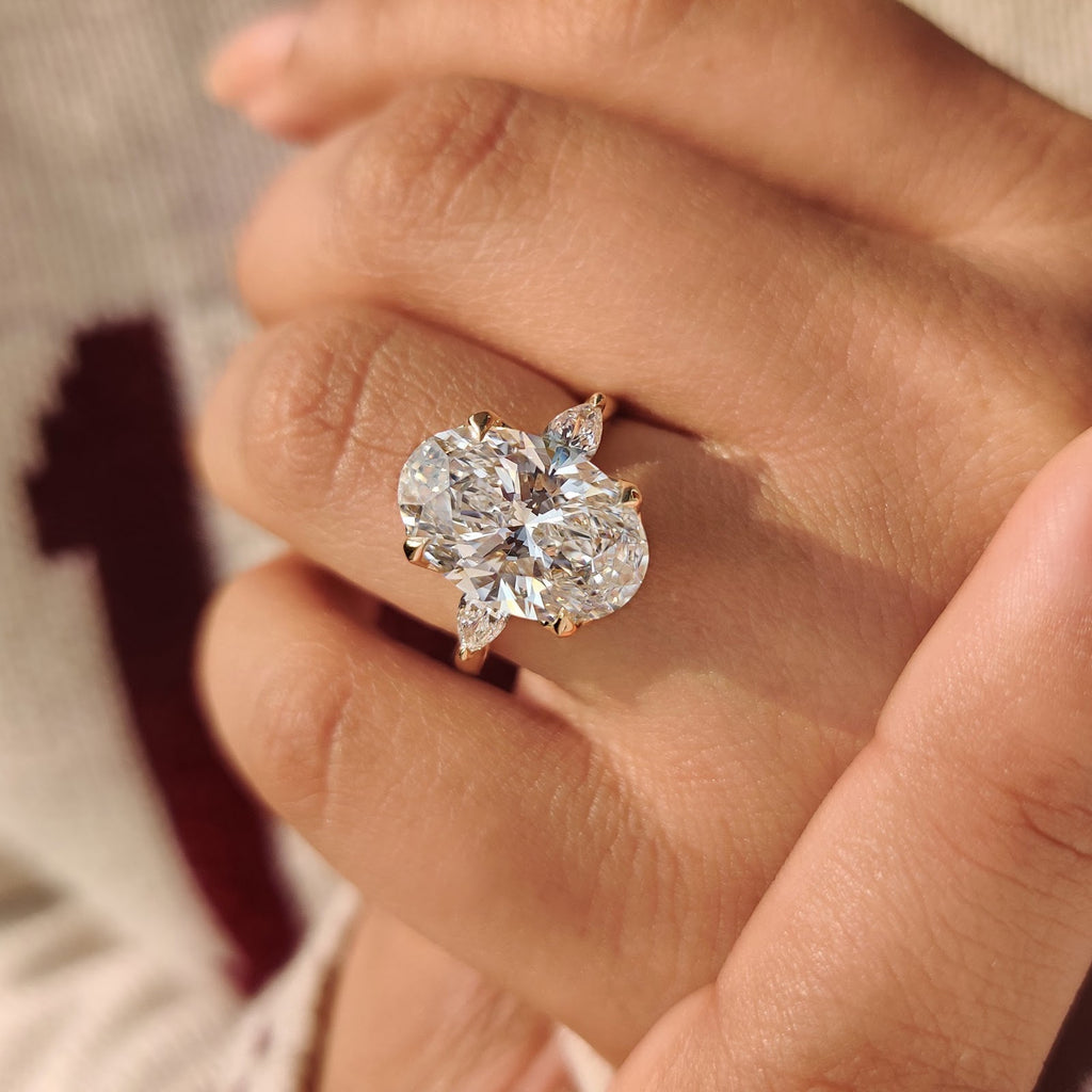 5.0 CT Oval Diamond Brilliance Pear Accent Three Stone Engagement Ring