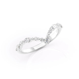 Curved wedding band with round and marquise diamonds – graceful and unique design