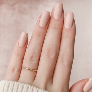 Classic plain wedding band with polished finish – timeless unisex design