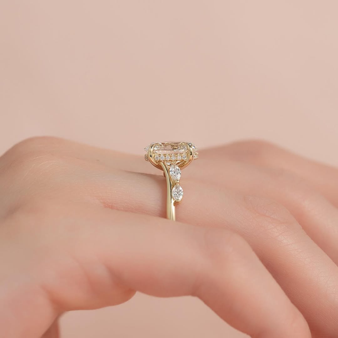 Oval cut CVD lab grown diamond engagement ring with pave band in 14K gold, designed for brilliance and soft romantic lines.