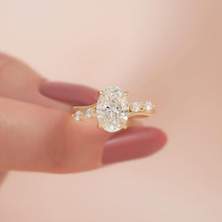 Oval cut CVD lab grown diamond engagement ring with pave band in 14K gold, designed for brilliance and soft romantic lines.