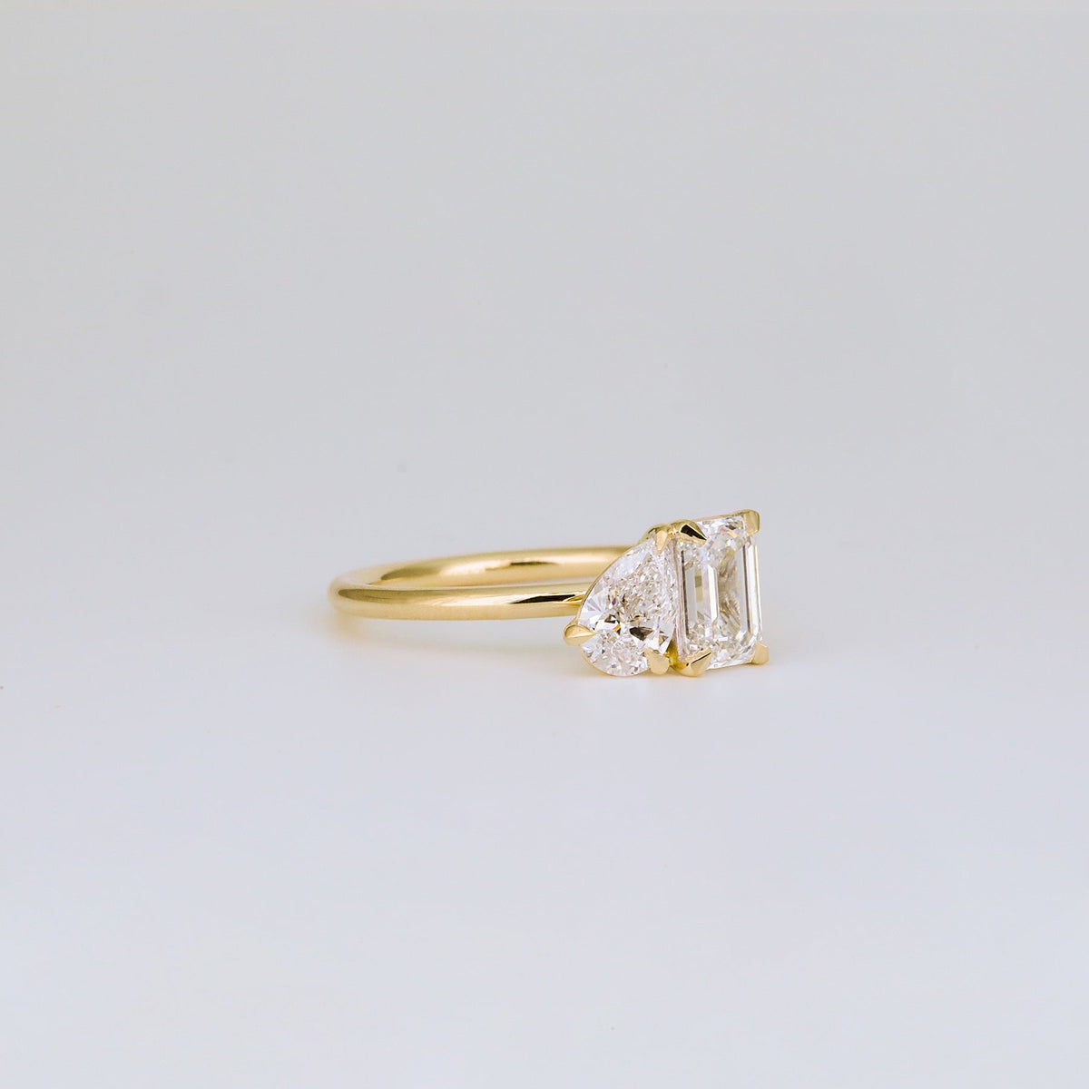 1.47 TCW Emerald & Pear Diamond Two Stone Engagement Ring