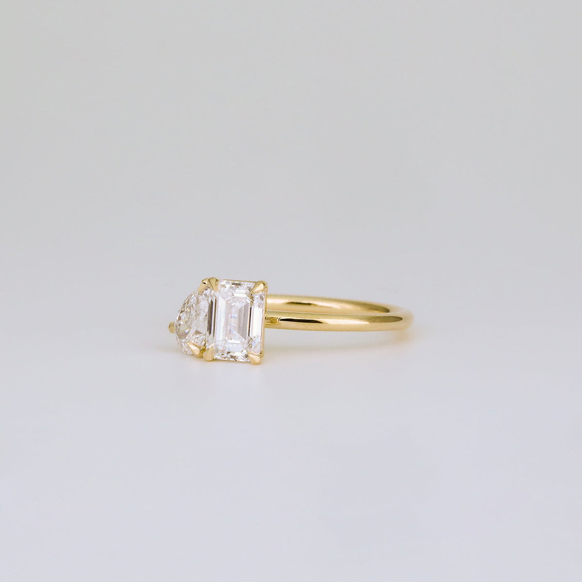 1.47 TCW Emerald & Pear Diamond Two Stone Engagement Ring