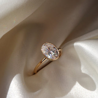 Bezel Ring with 1.20 CT Oval Moissanite - violetjewels