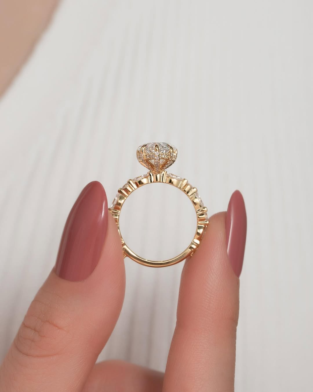 1.0–3.0 CT pear cut CVD diamond engagement ring with pave setting in 14K gold, showcasing teardrop shape and shimmering elegance.