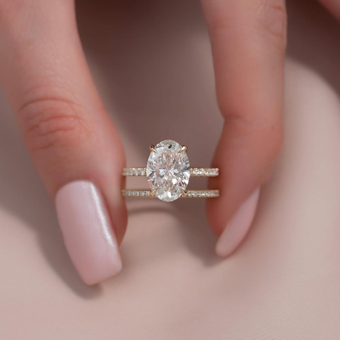 Oval cut CVD lab grown diamond engagement ring with pave setting in 14K gold, offering refined sparkle and graceful design.