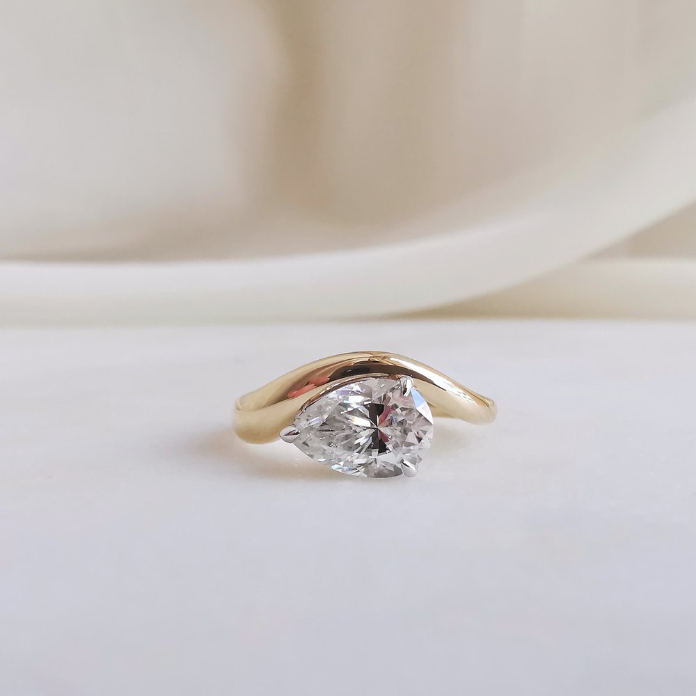 1.50 CT Pear Cut Unique Solitaire Style Moissanite Engagement Ring