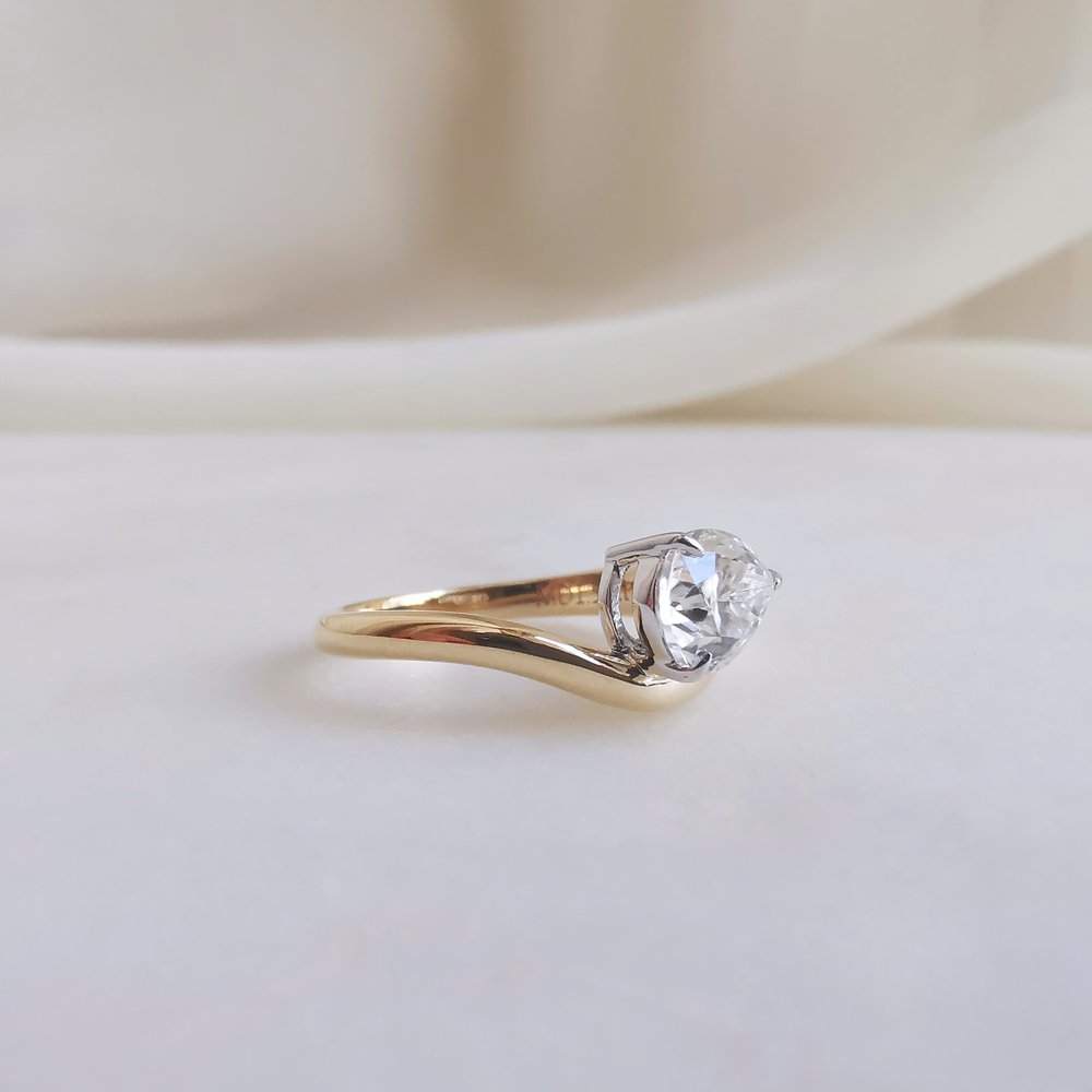 1.50 CT Pear Cut Unique Solitaire Style Moissanite Engagement Ring