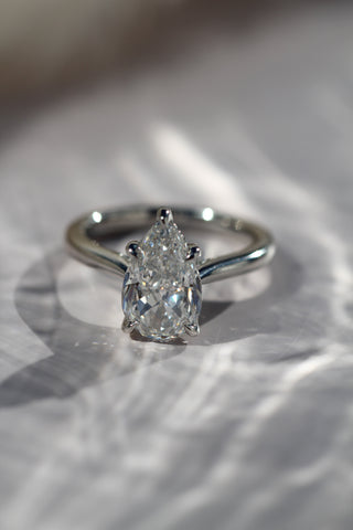 1.0 CT Pear E-VVS1 Diamond Hidden Halo Engagement Ring