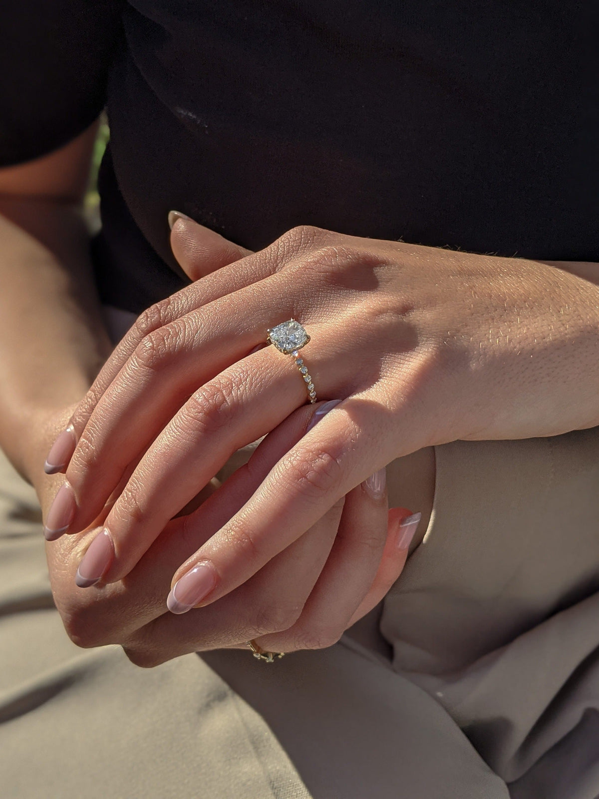 Cushion cut lab grown diamond engagement ring with pave band in 14K gold, featuring soft corners and radiant sparkle.