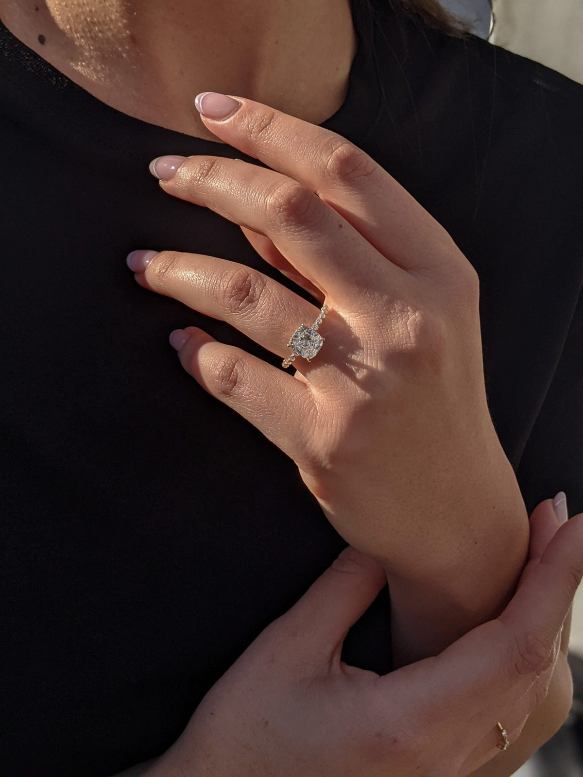 Cushion cut lab grown diamond engagement ring with pave band in 14K gold, featuring soft corners and radiant sparkle.