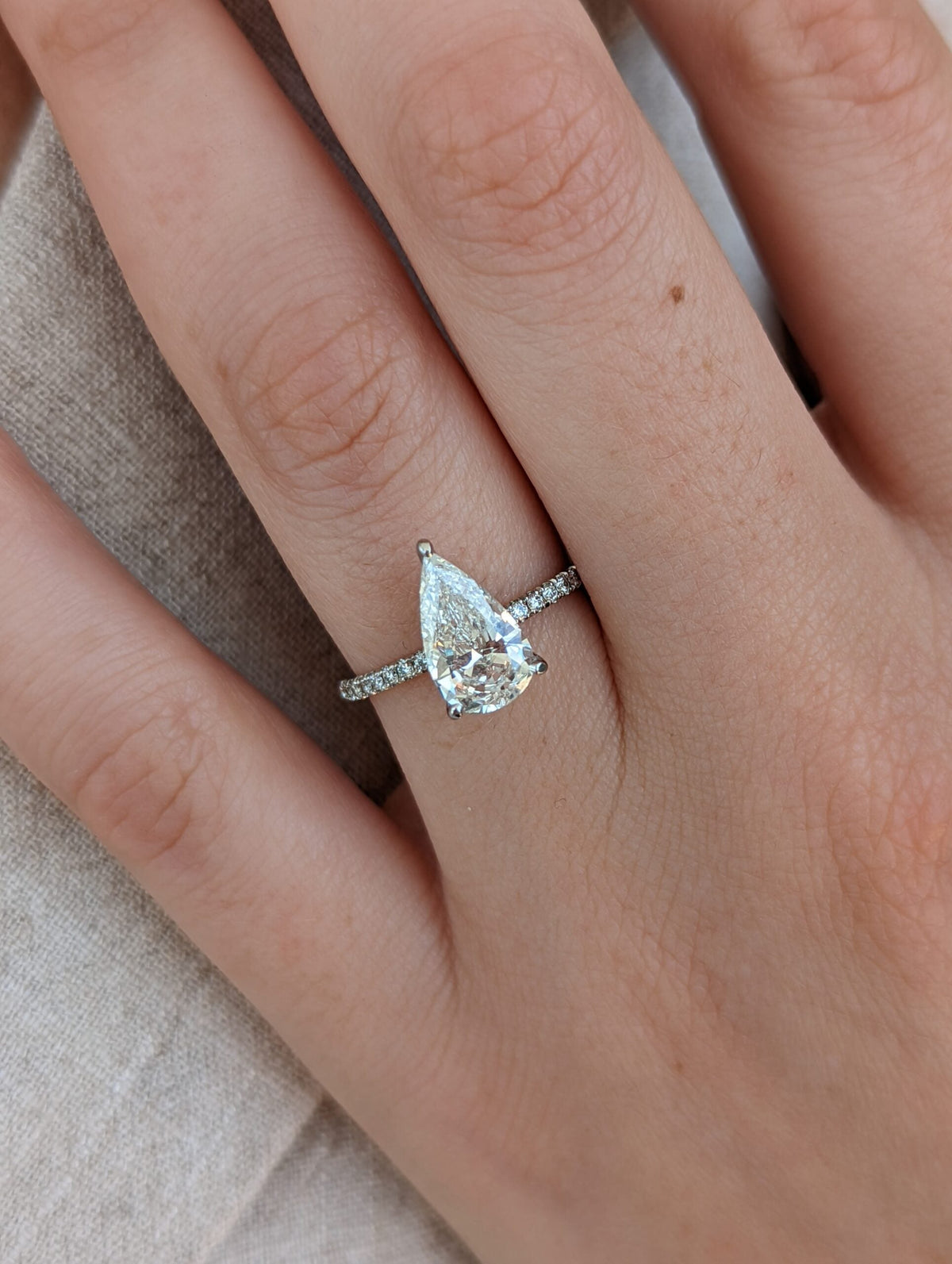 Pear Diamond Pave Style Engagement Ring featuring elegant pear cut and sparkling pave setting