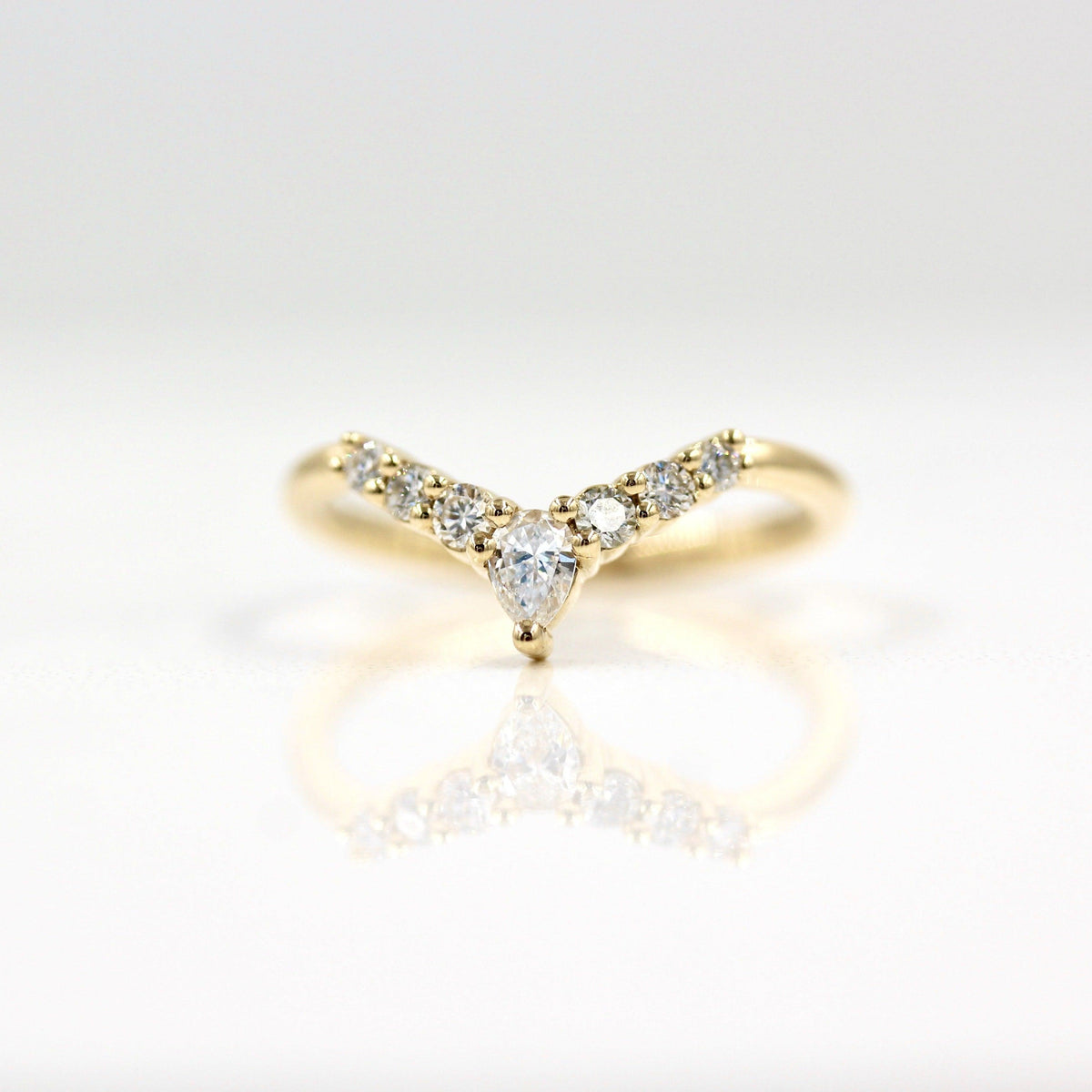 0.31 TCW Round & Pear Cut Curved Moissanite Wedding Band - violetjewels