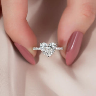 1.0–3.0 CT heart cut CVD diamond engagement ring with pave band in 14K gold, symbolizing love with radiant brilliance.