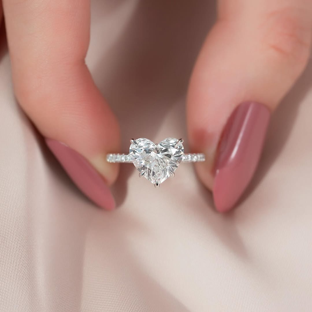 1.0–3.0 CT heart cut CVD diamond engagement ring with pave band in 14K gold, symbolizing love with radiant brilliance.