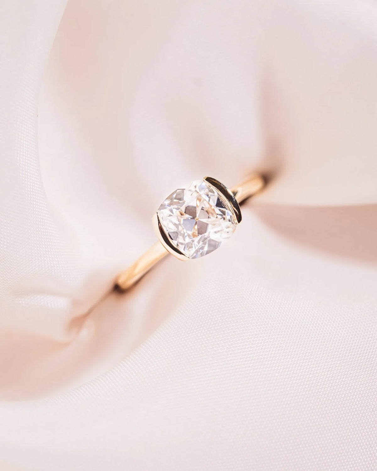 Cushion Diamond East West Half Bezel Engagement Ring