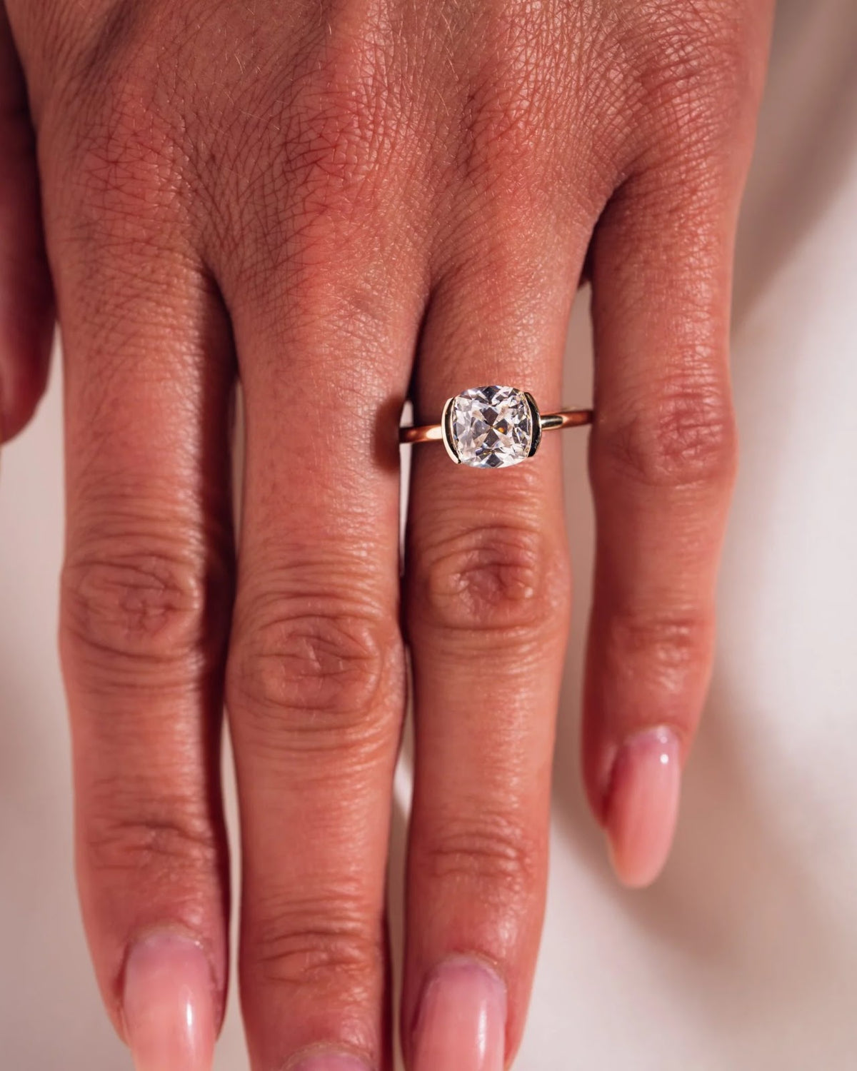 Cushion Diamond East West Half Bezel Engagement Ring