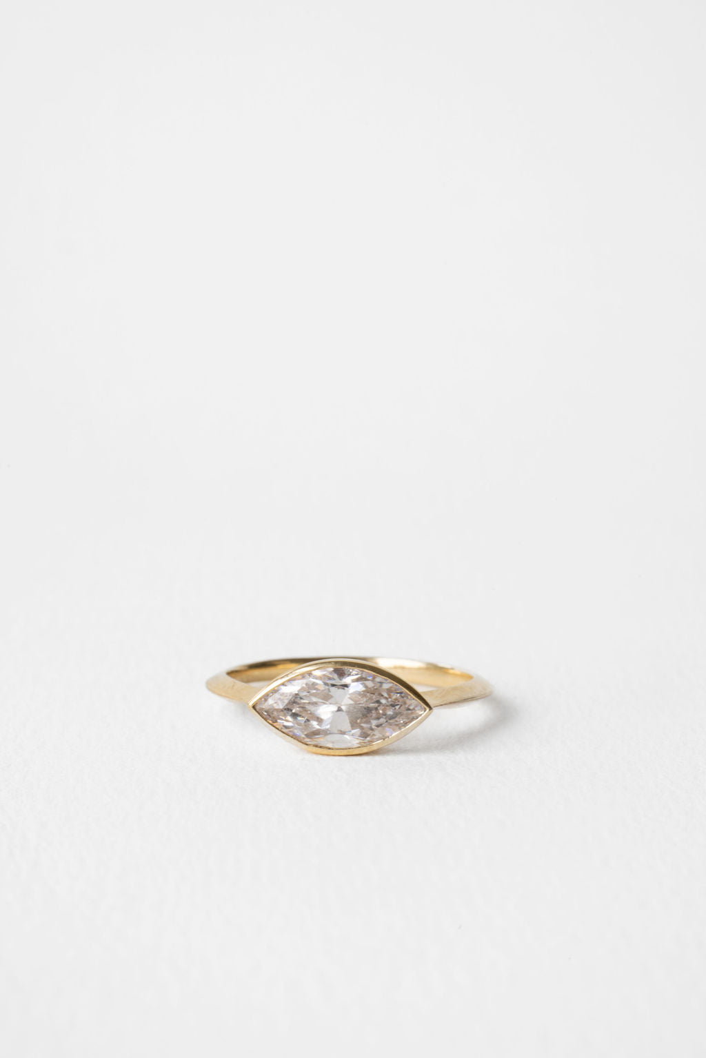 East West Marquise Diamond Silhouette Bezel Engagement Ring