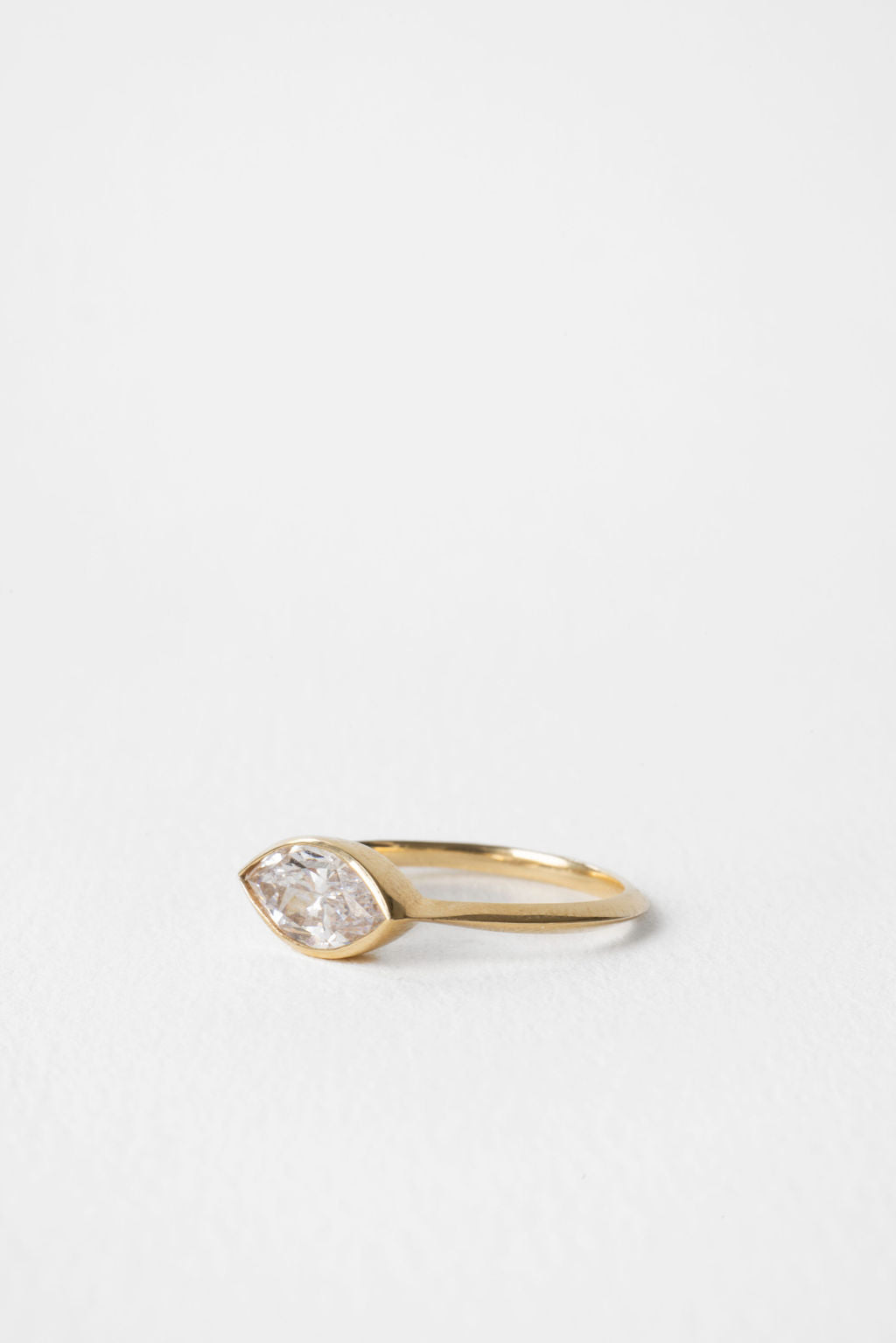 East West Marquise Diamond Silhouette Bezel Engagement Ring