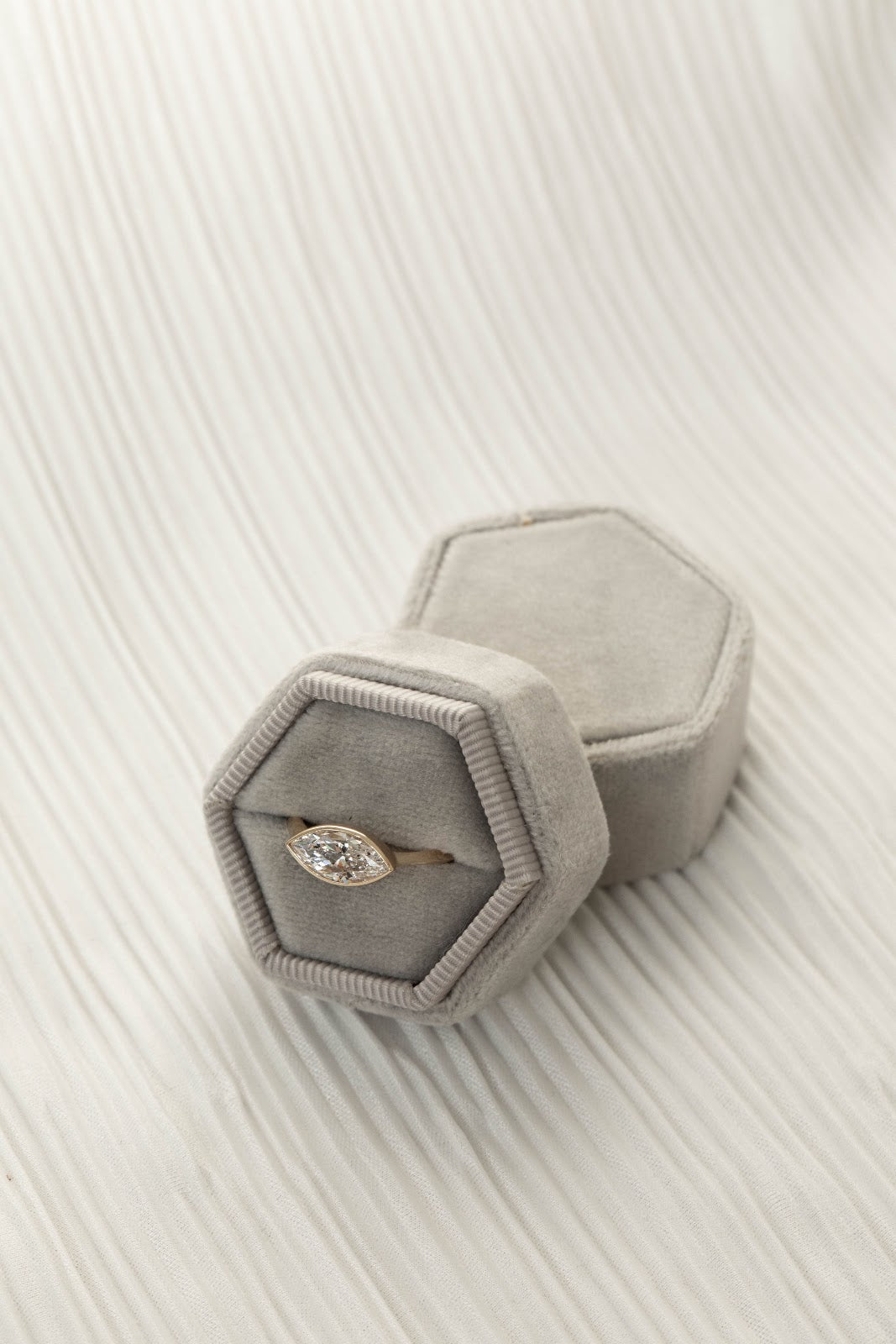 East West Marquise Diamond Silhouette Bezel Engagement Ring