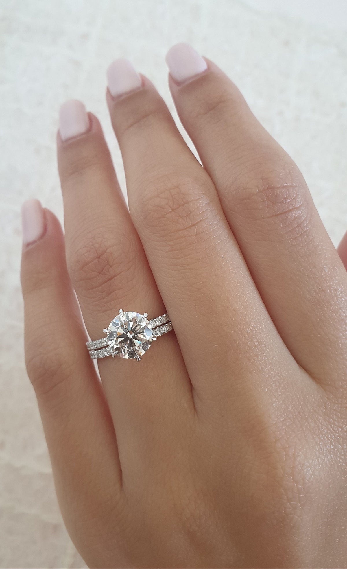 Round Diamond Pave Style Engagement Ring with brilliant round cut and sparkling pave details