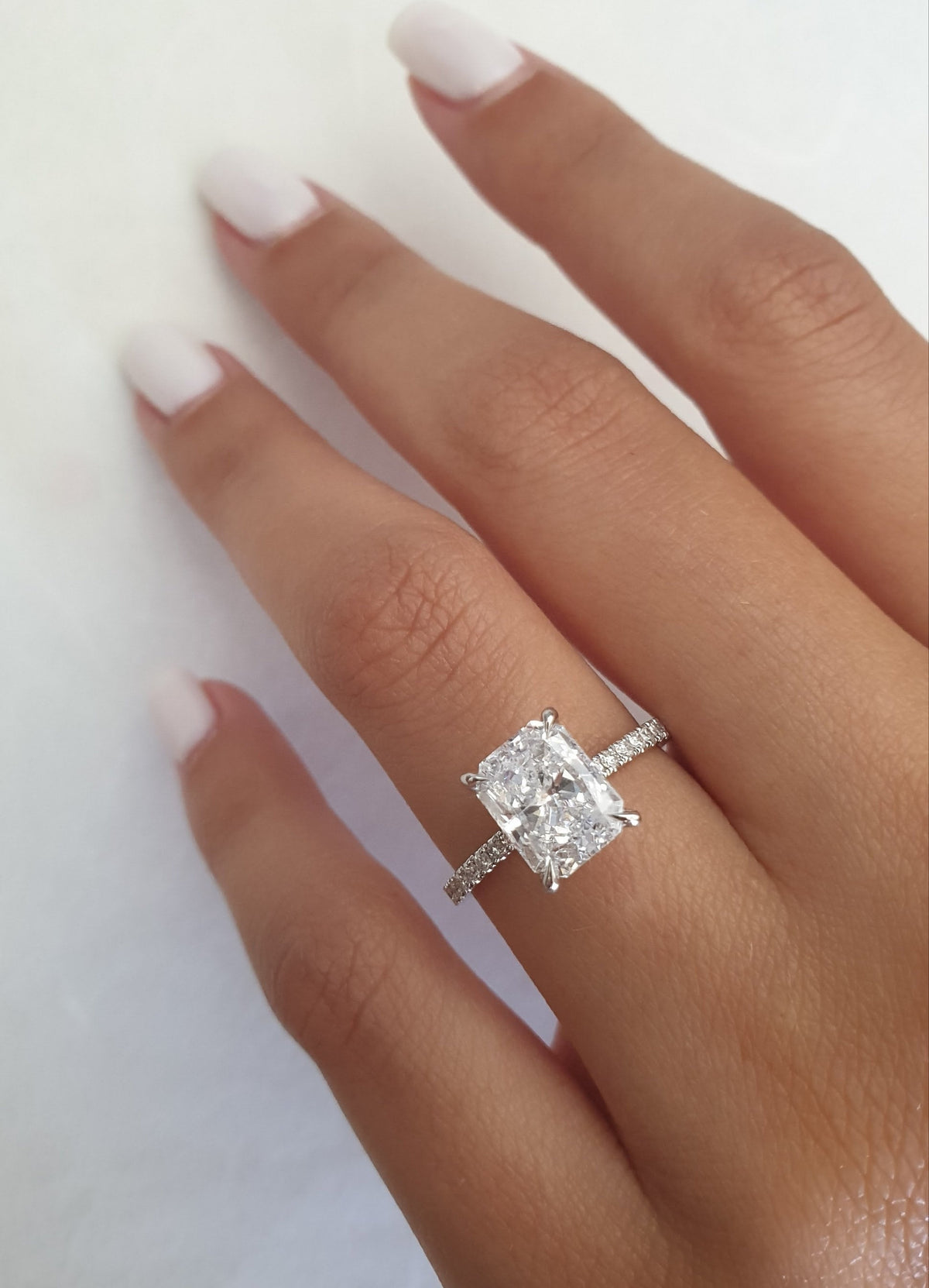 Radiant Diamond Engagement Ring with sparkling pave setting in a modern, elegant design