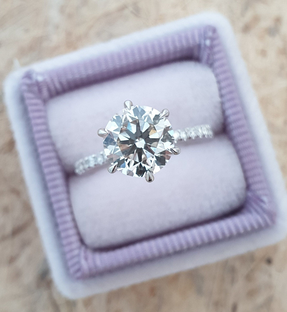 Round Diamond Pave Style Engagement Ring with brilliant round cut and sparkling pave details