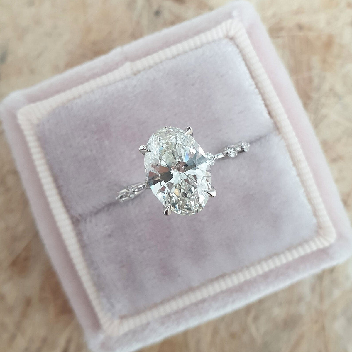 Oval Diamond Dainty Engagement Ring with delicate band and sparkling oval cut diamond