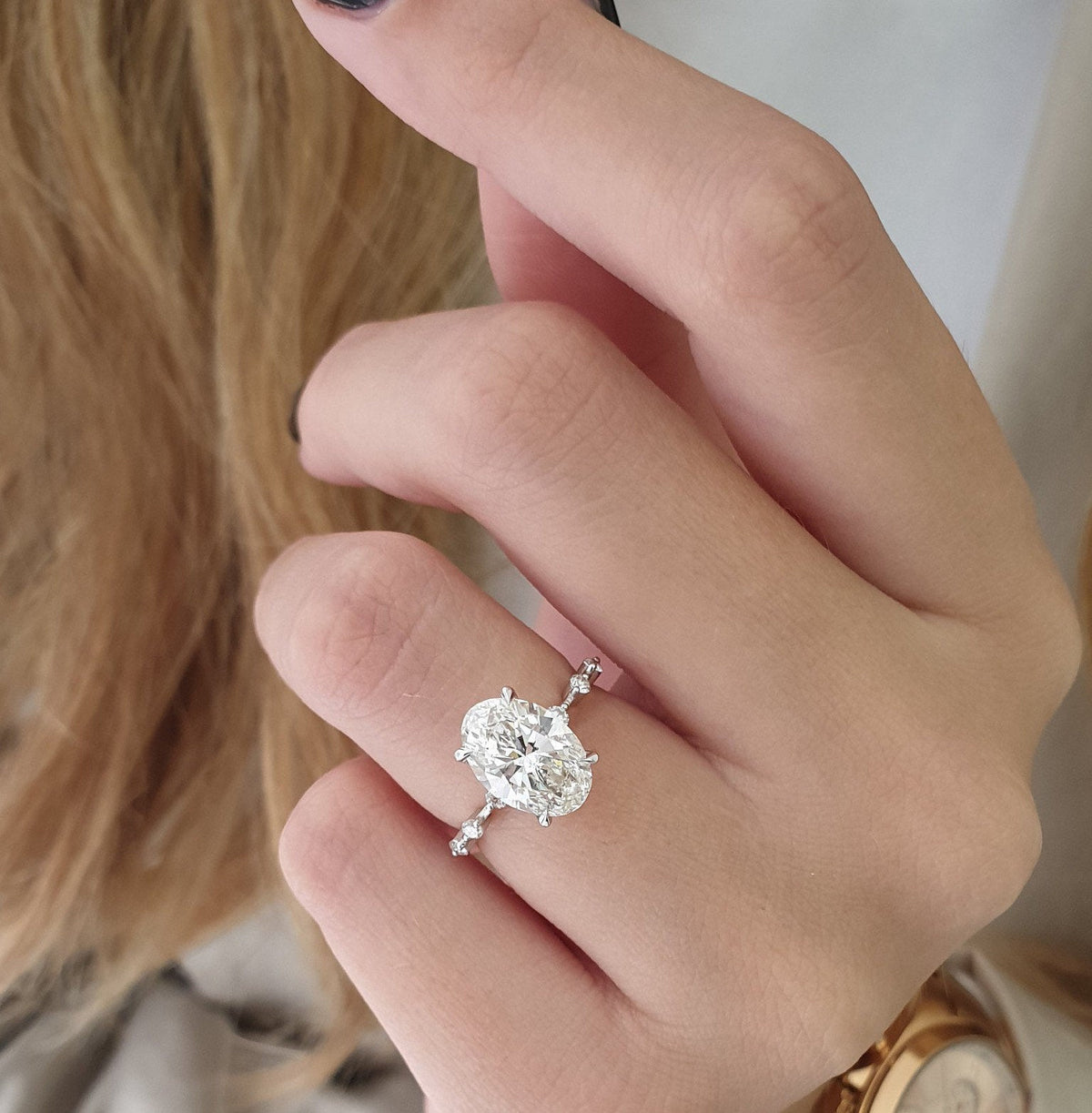 Oval Diamond Dainty Engagement Ring with delicate band and sparkling oval cut diamond