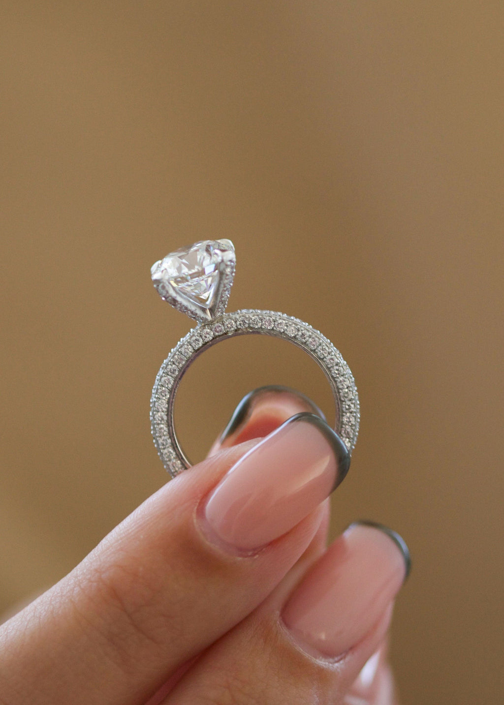 Round Diamond Engagement Ring with pave setting and sparkling round cut center stone