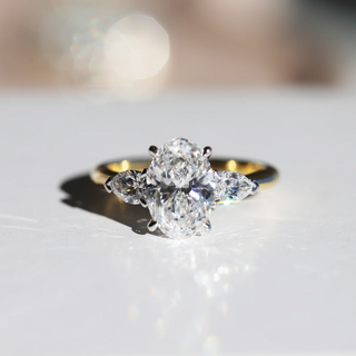 1.0-3.0 T Oval Lab Grown  Diamond Three Stone Engagement Ring