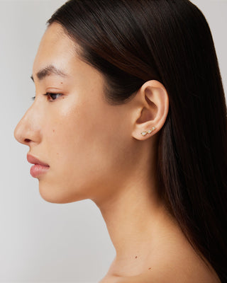 0.70 TCW Pear Corridor Stud Earrings