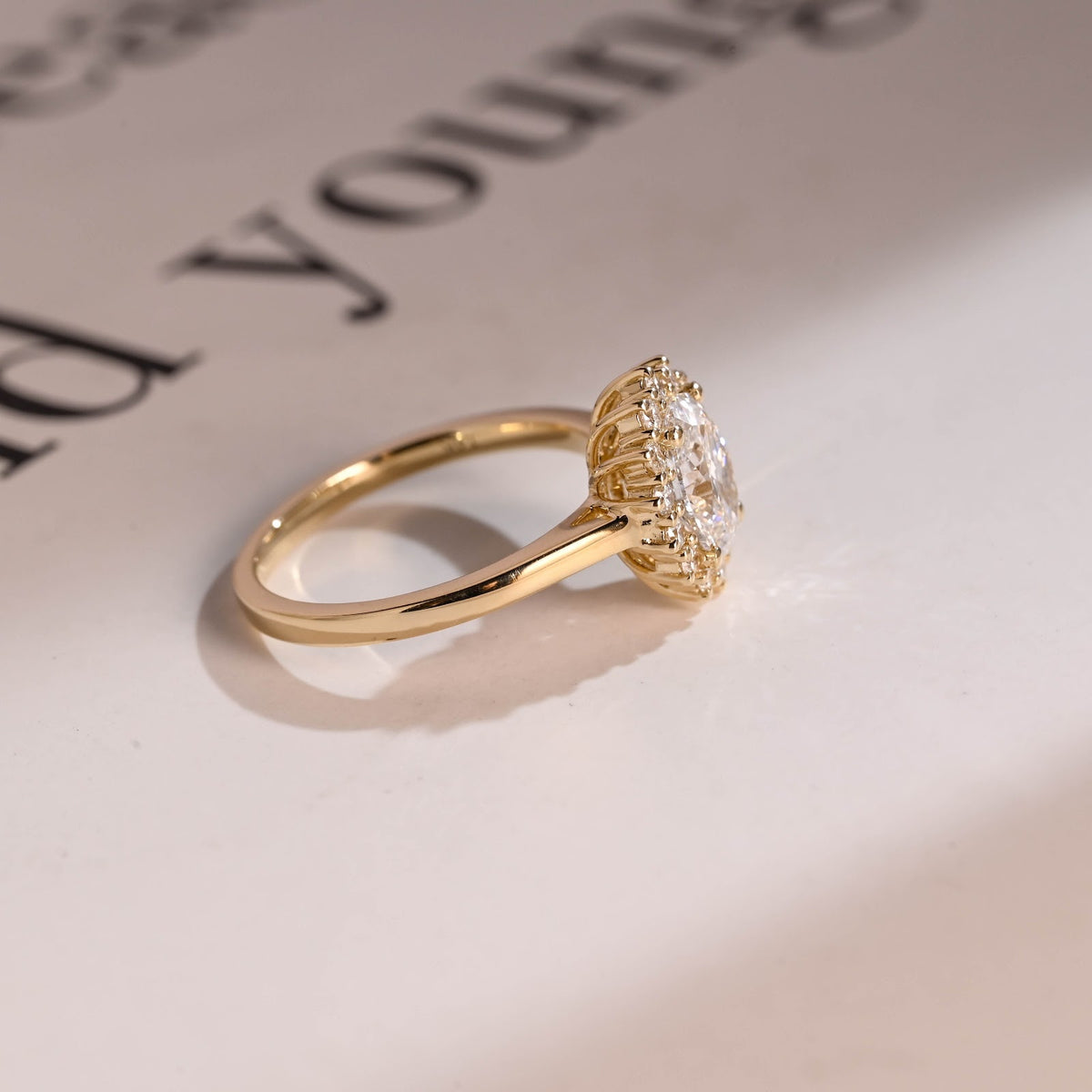 Oval Cut Diamond Radiance Halo Engagement Ring