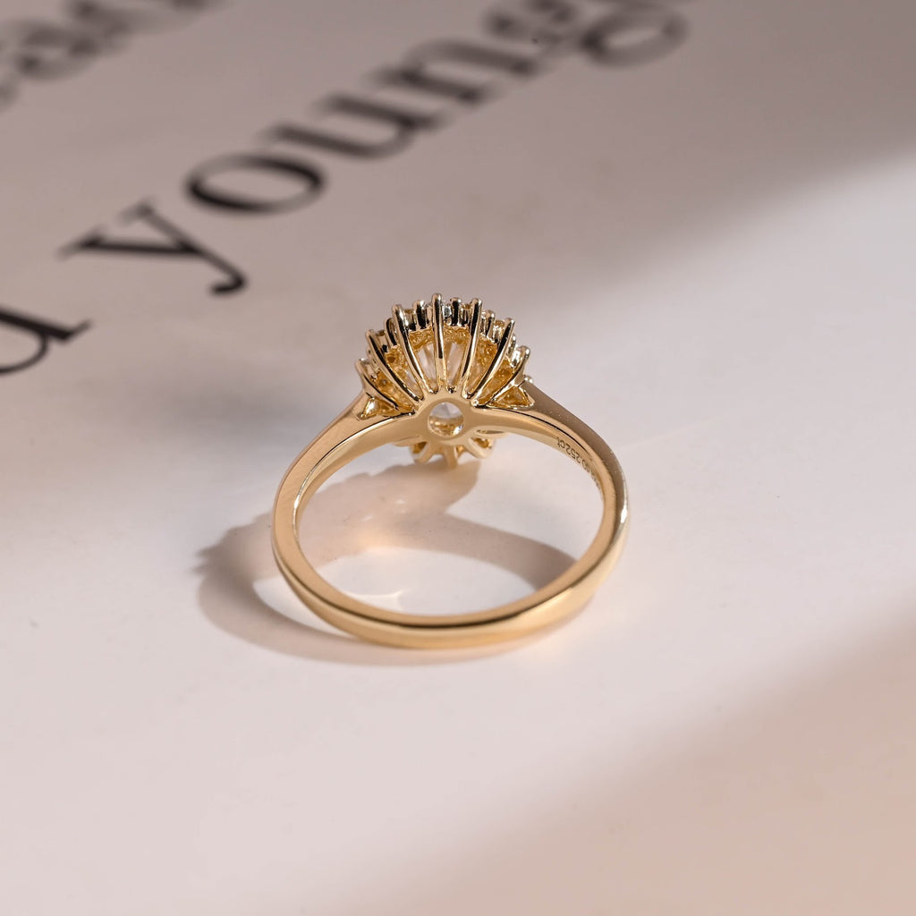 Oval Cut Diamond Radiance Halo Engagement Ring