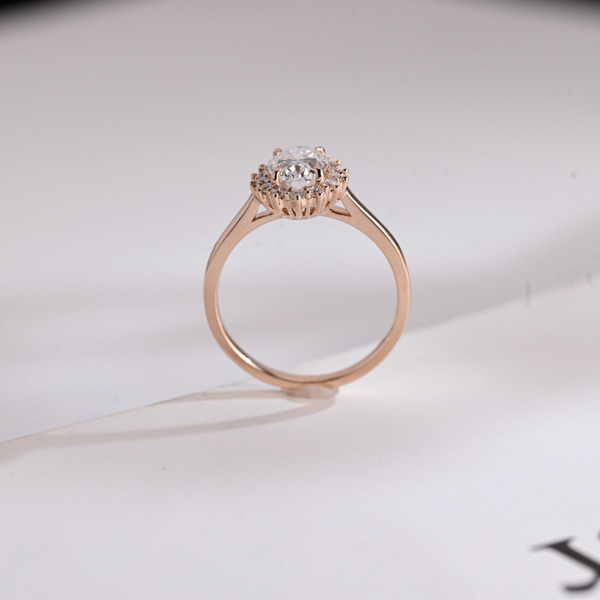 Oval Cut Diamond Radiance Halo Engagement Ring