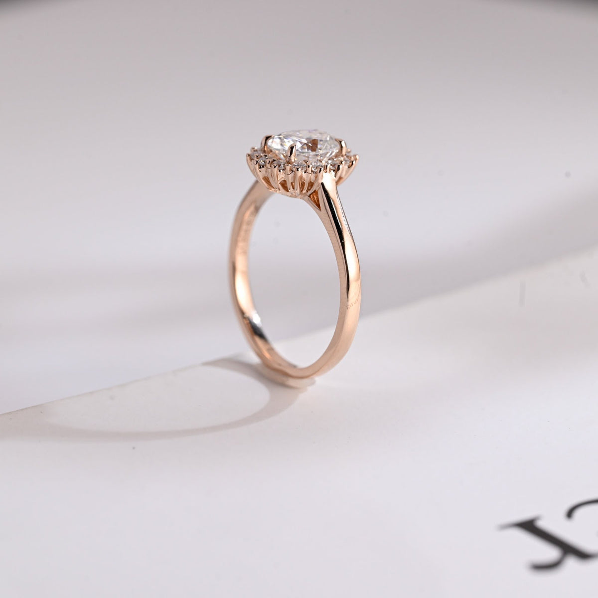 Oval Cut Diamond Radiance Halo Engagement Ring