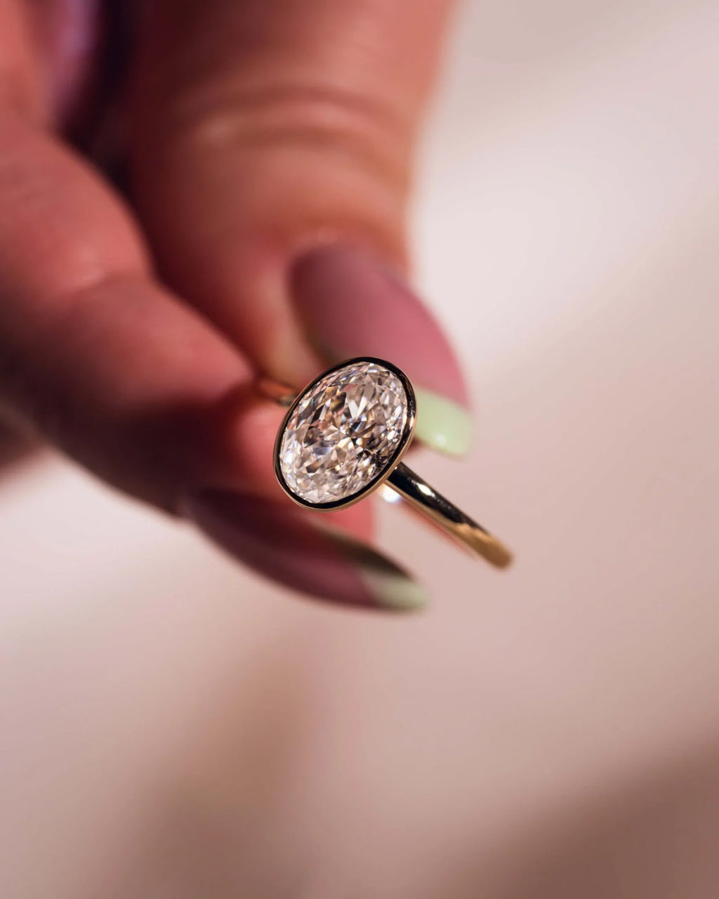 Oval Diamond Brilliance Bezel Solitaire Engagement Ring
