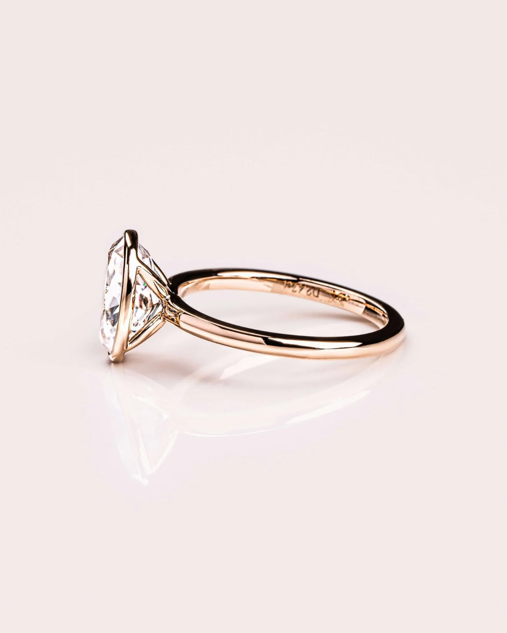 Oval Diamond Brilliance Bezel Solitaire Engagement Ring