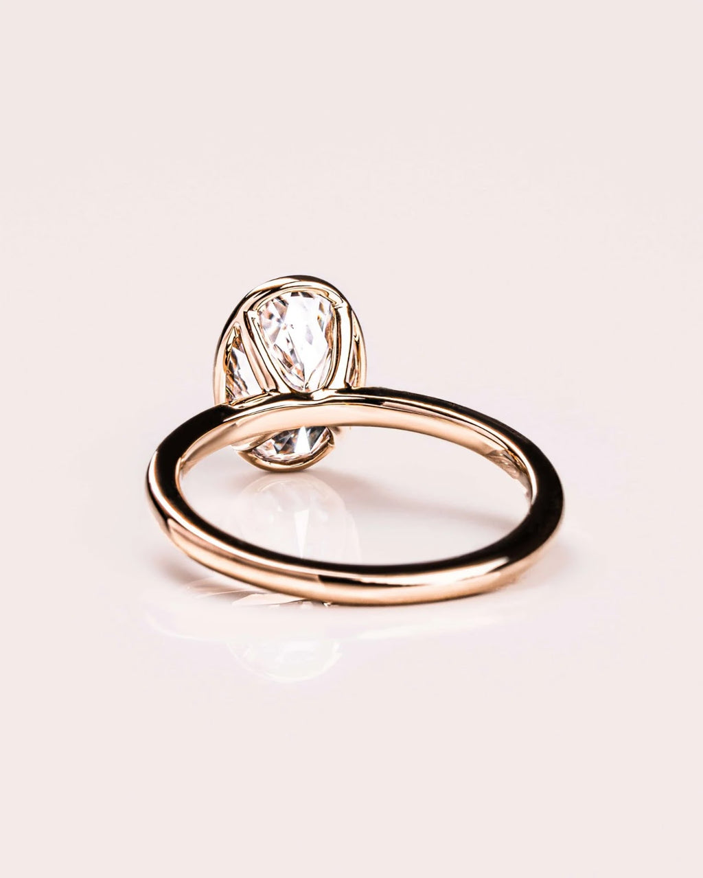 Oval Diamond Brilliance Bezel Solitaire Engagement Ring