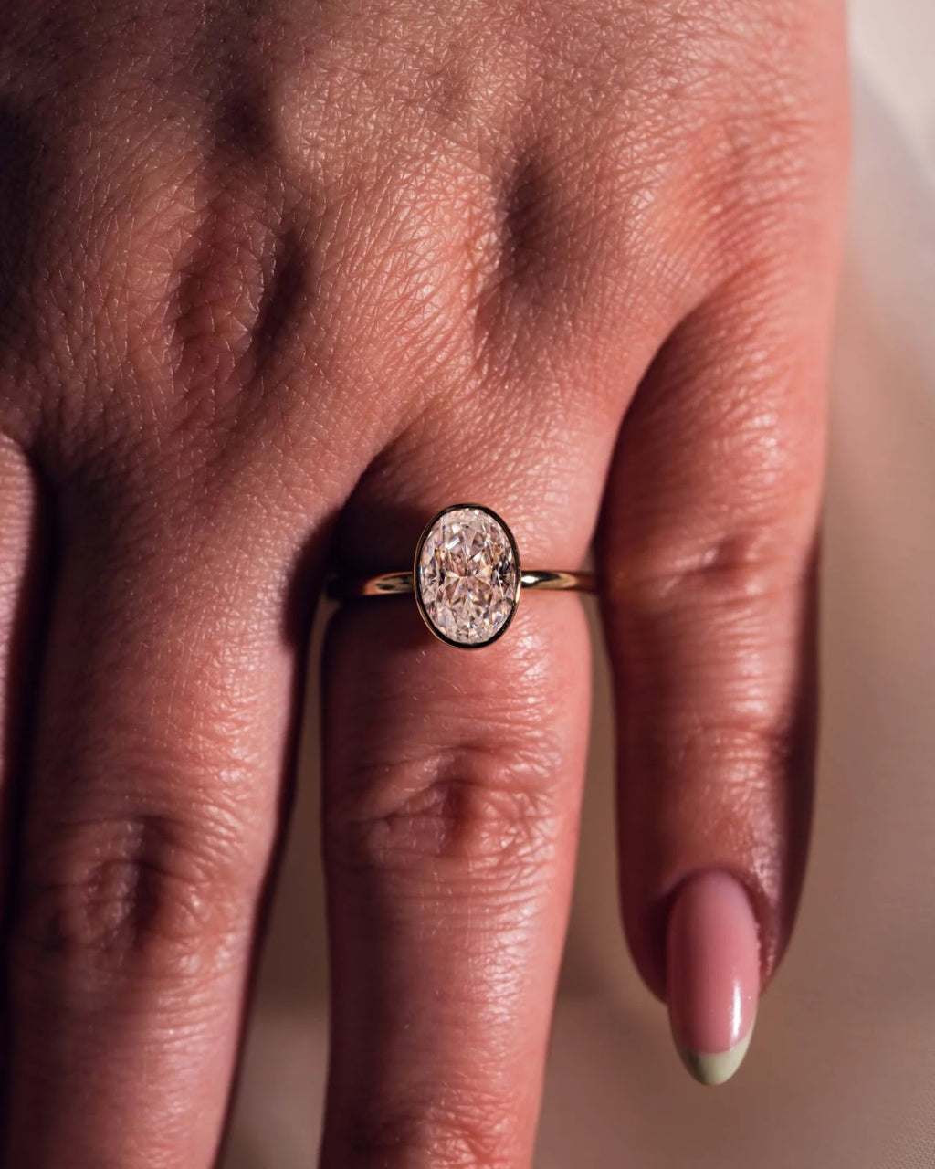 Oval Diamond Brilliance Bezel Solitaire Engagement Ring